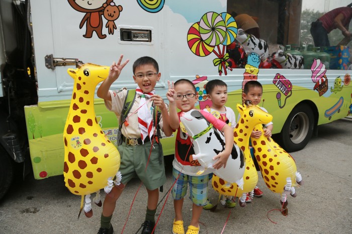The mobile fun truck filled with animal balloons spreads joy wherever they go.